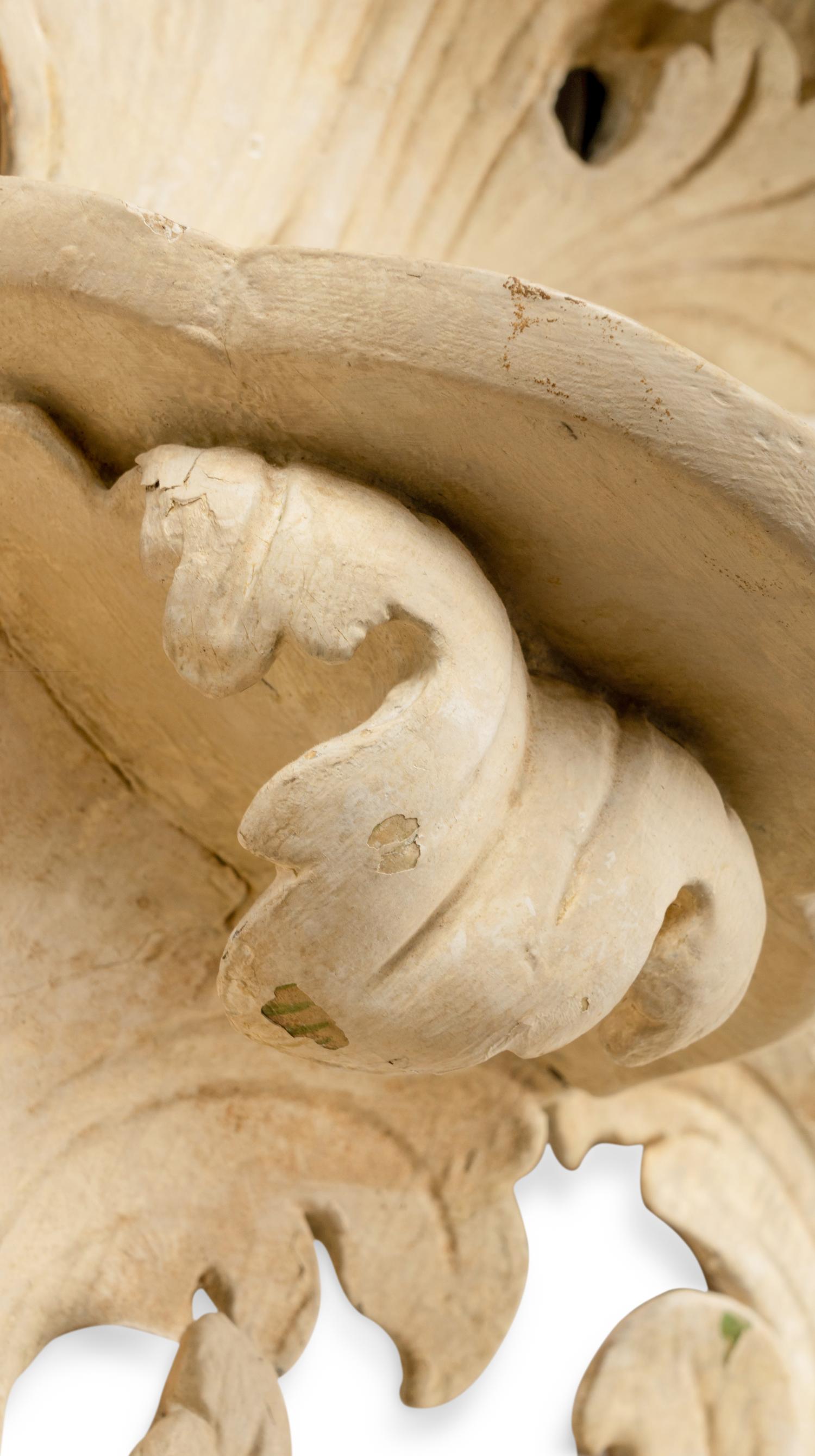 A Pair of Northern European Cream-Painted Brackets