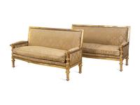 A Pair of Régence Style Carved Giltwood Sofas