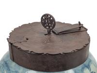 An Iron Mounted Blue and White Porcelain Locking Tea Caddy