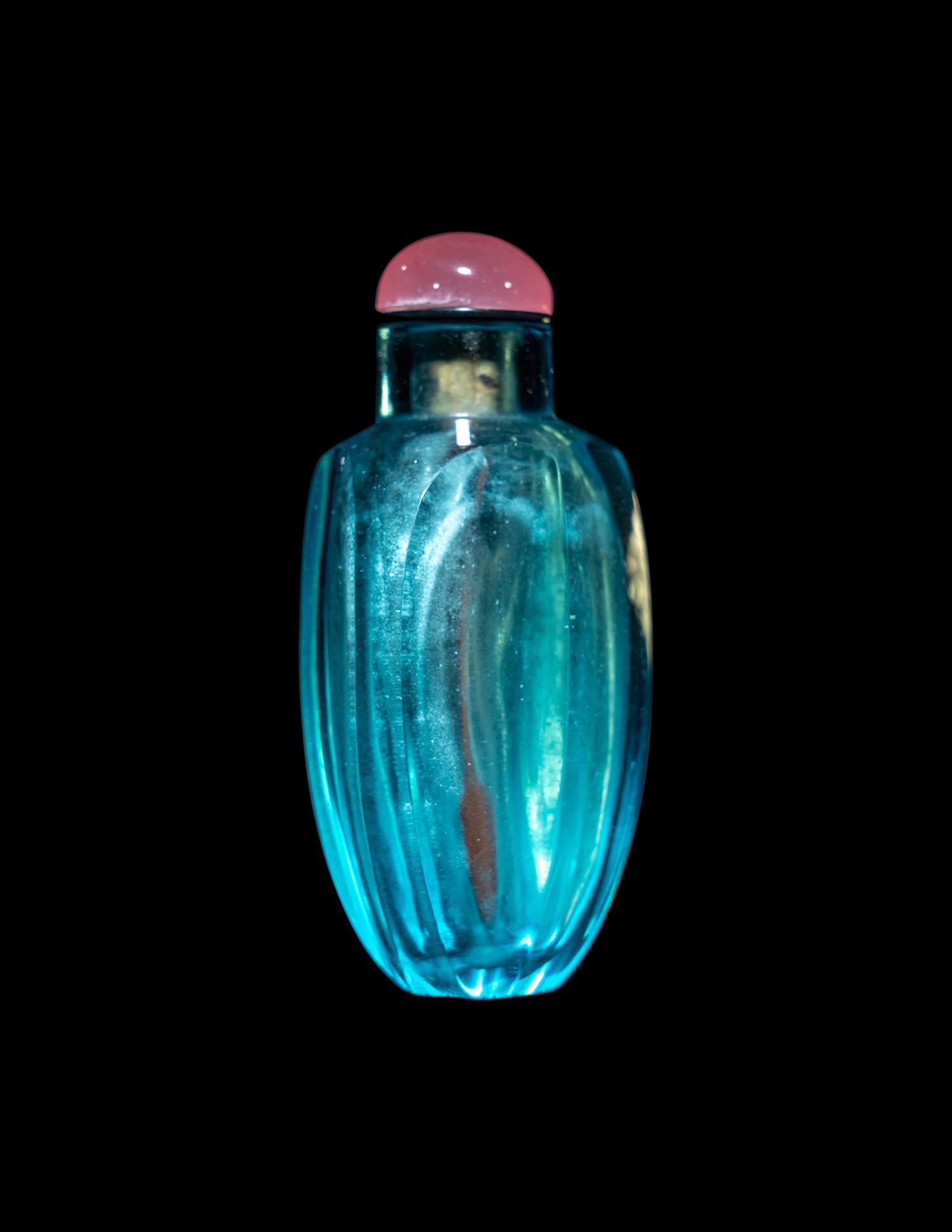 A Chinese Aquamarine Glass Faceted Snuff Bottle