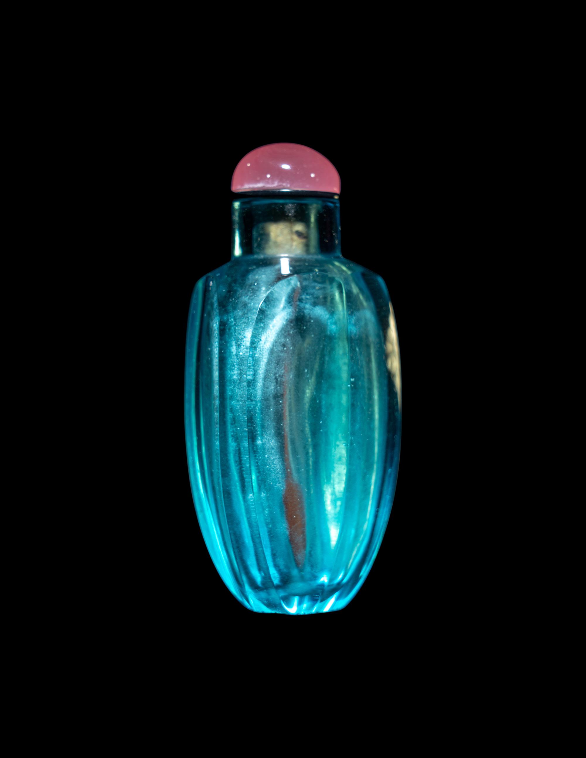A Chinese Aquamarine Glass Faceted Snuff Bottle