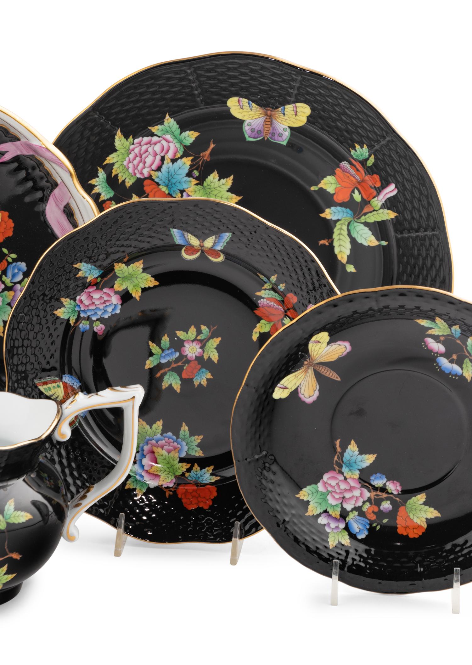 A Herend Queen Victoria Black Porcelain Dinner Service