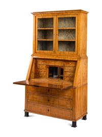A Biedermeier Figured Walnut Secretary Bookcase