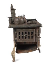 A 'Triumph' Range Salesman's Sample or Child's Toy Cast Iron Stove