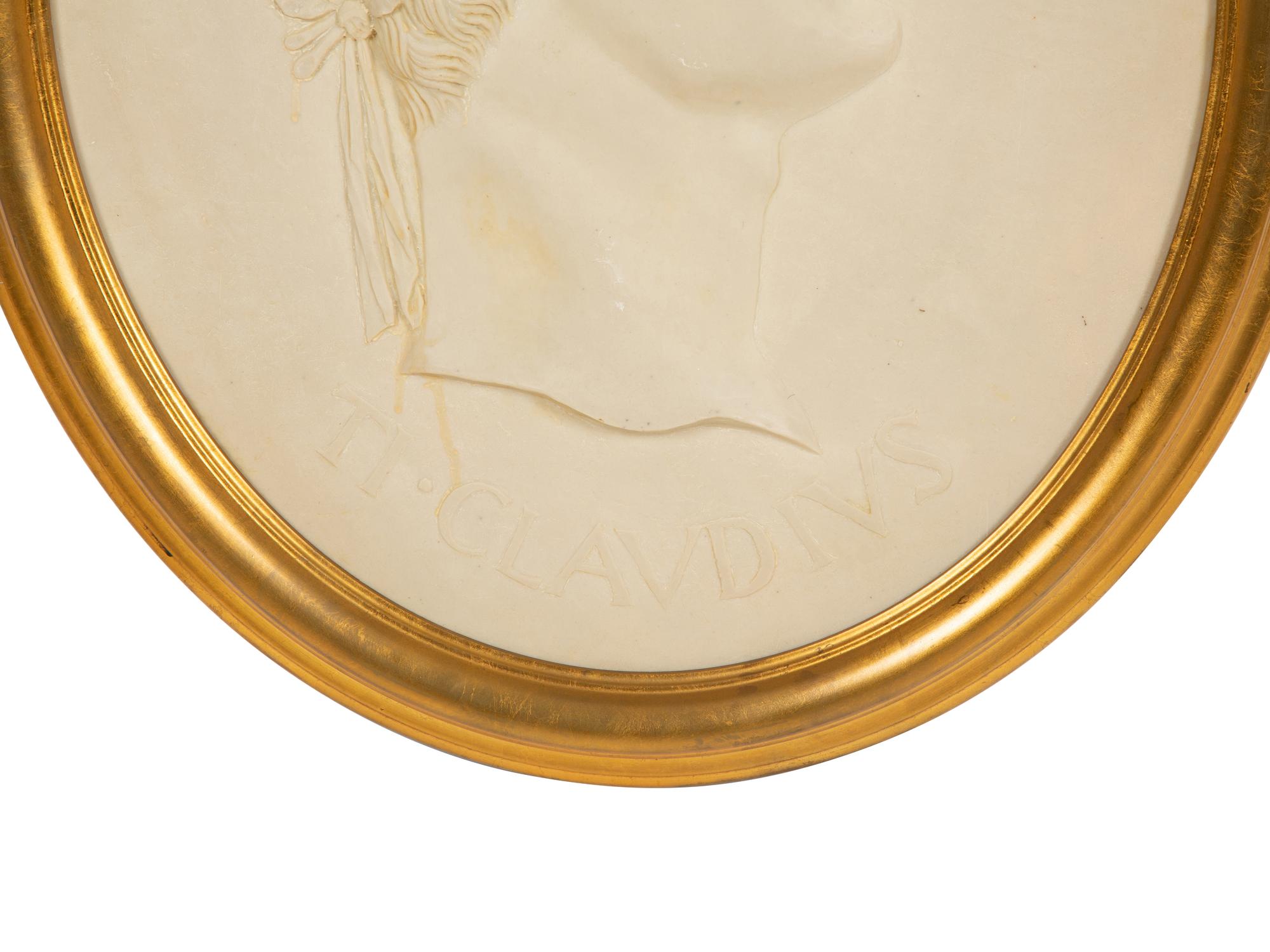 A Pair of Roman Style Composition Relief Plaques in Giltwood Frames