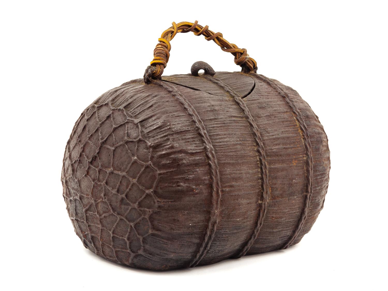 A Japanese Bronze Covered Vessel