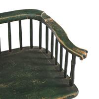 A Green-Painted Low Back Windsor Settee
