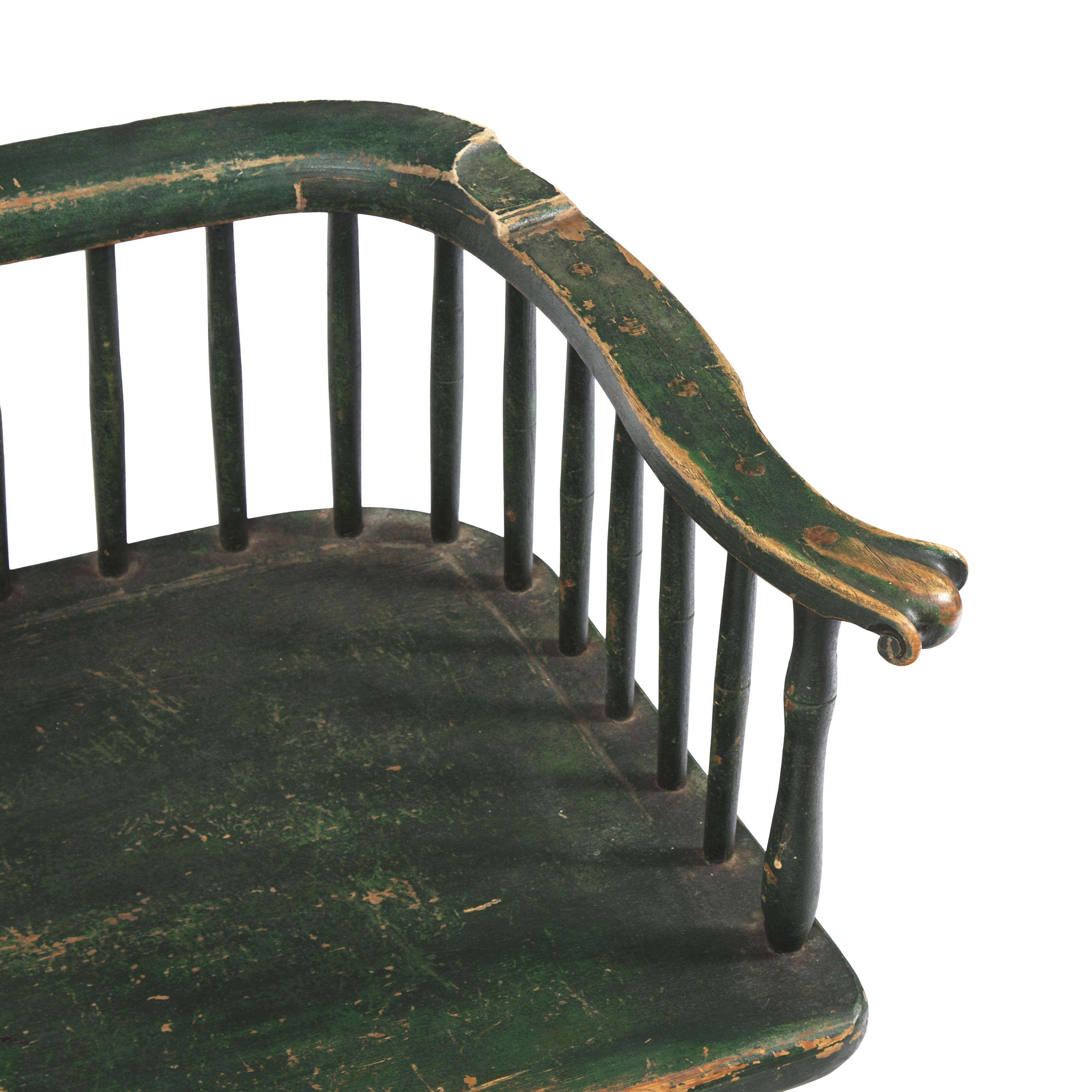 A Green-Painted Low Back Windsor Settee
