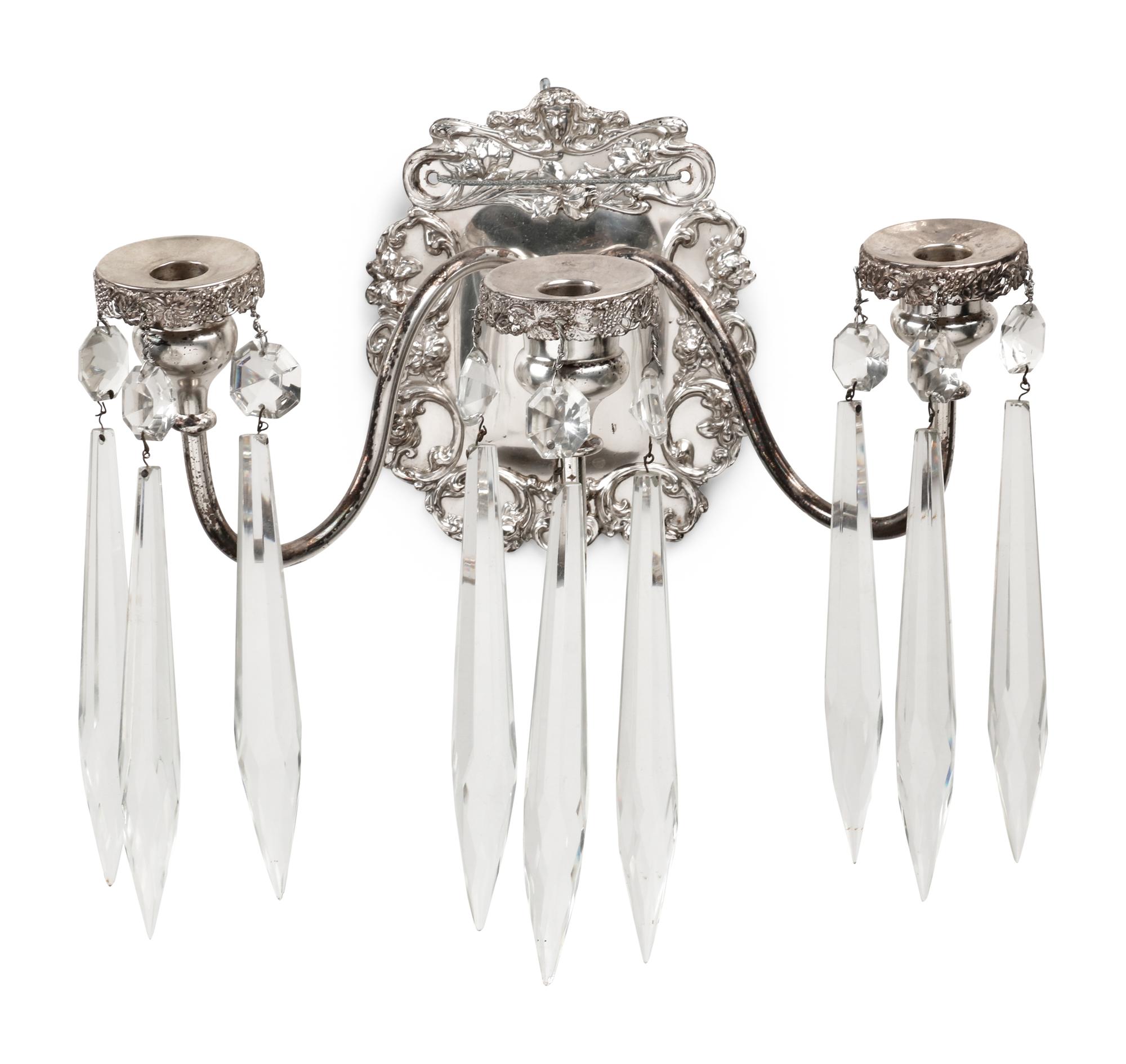 A Pair of Silvered Metal Three-Light Sconces