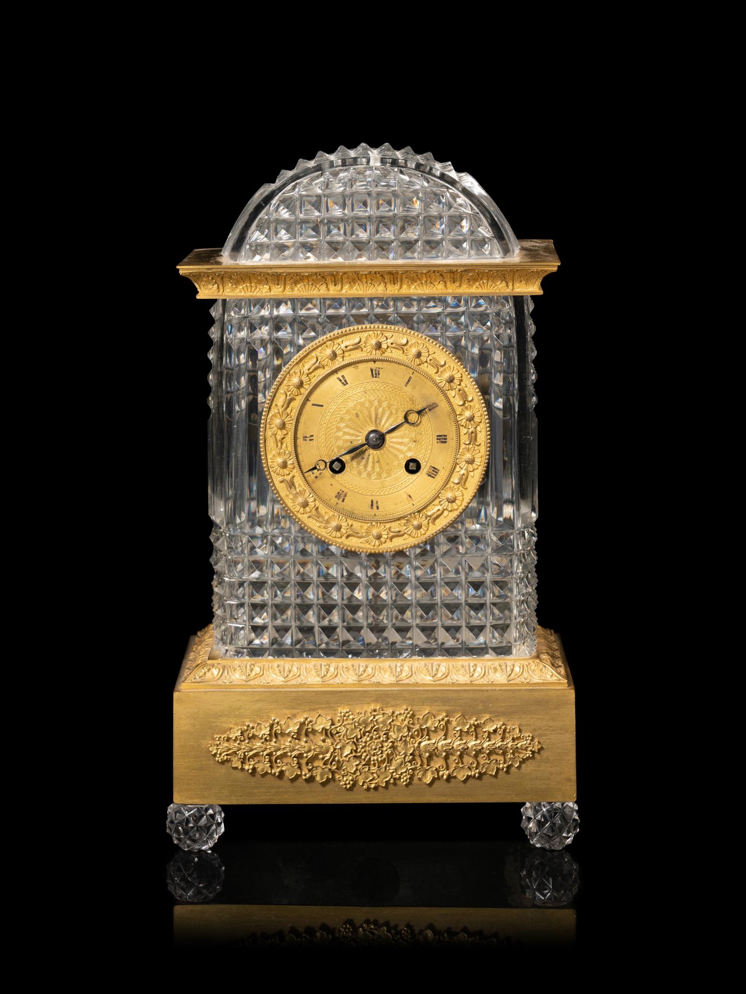 A Charles X Gilt Bronze and Cut Glass Mantel Clock
