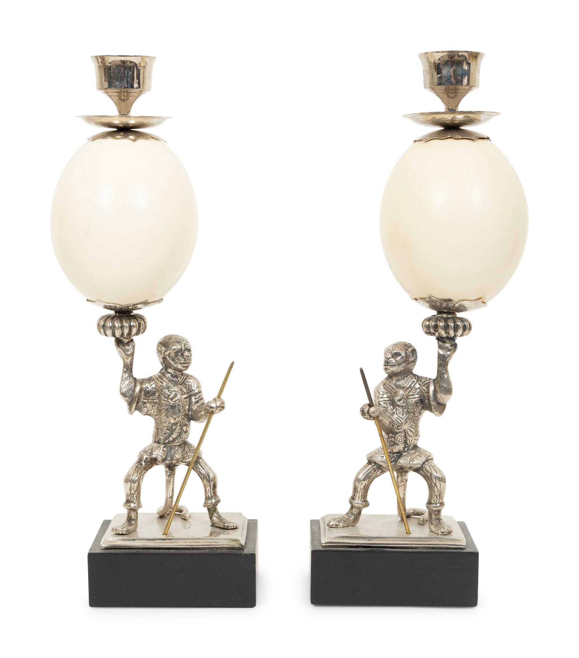 A Pair of Anthony Redmile Ostrich Egg and Nickel-Plated Candlesticks