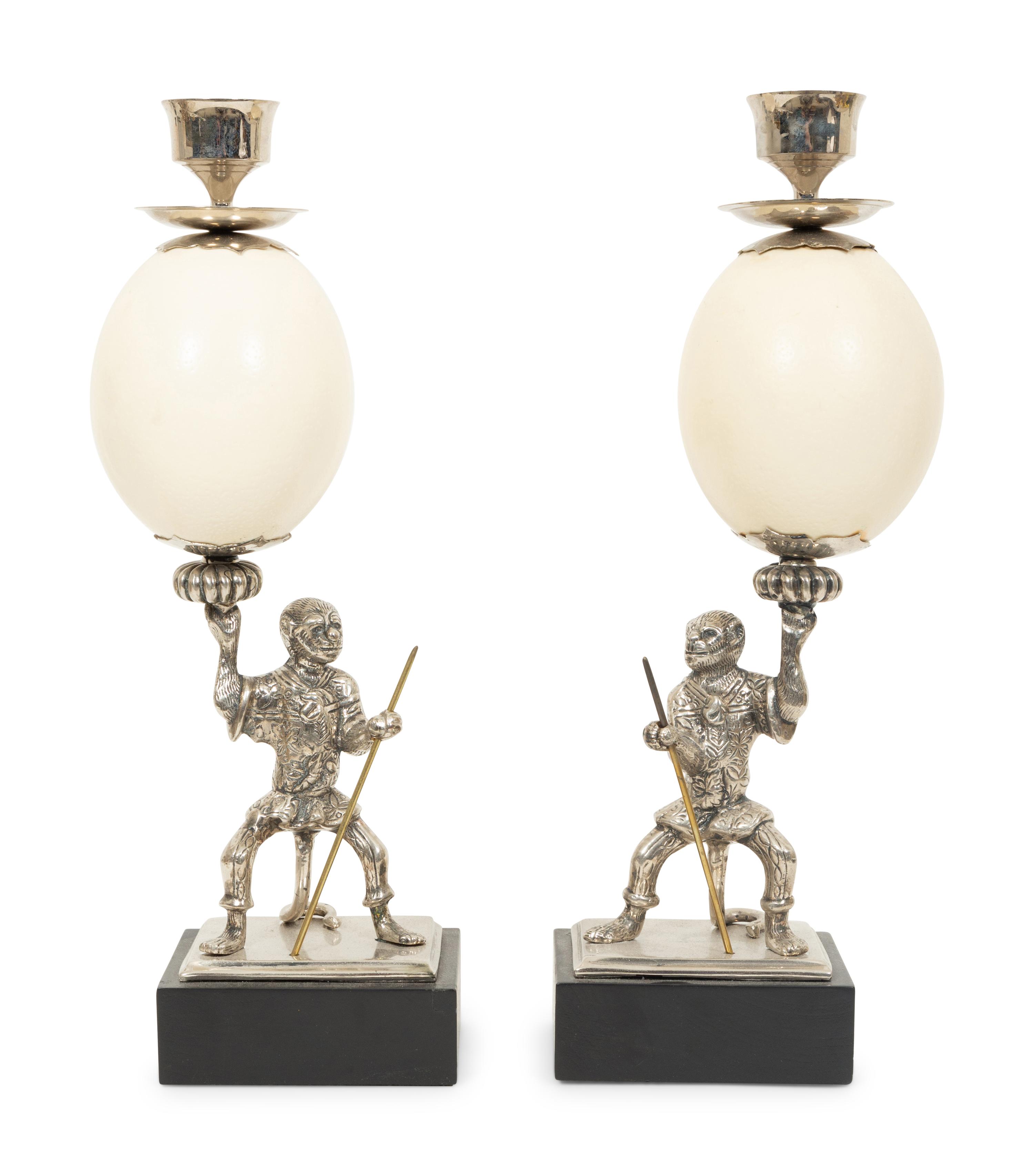 A Pair of Anthony Redmile Ostrich Egg and Nickel-Plated Candlesticks