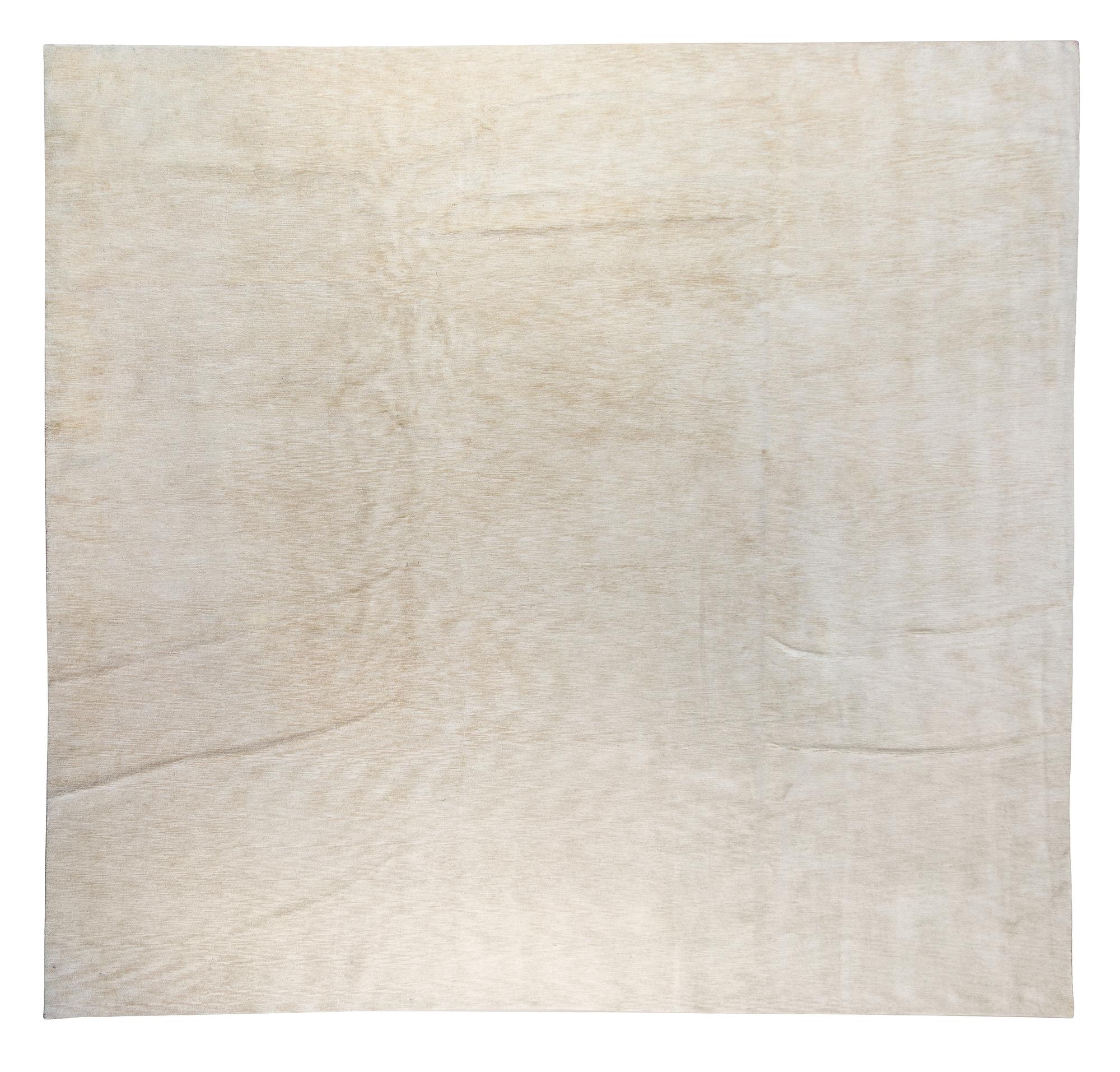A Nepalese Wool Rug 13 feet x 13 feet. — 20TH CENTURY