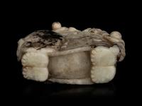 A Carved Jade ‘Elephant and Children’ Figural Group