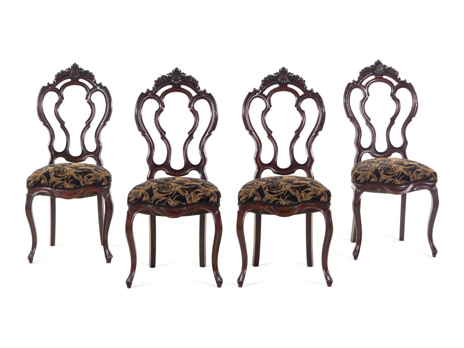 A Set of Four Rococo Revival Mahogany Side Chairs