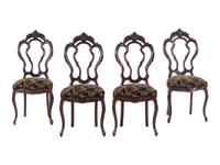 A Set of Four Rococo Revival Mahogany Side Chairs