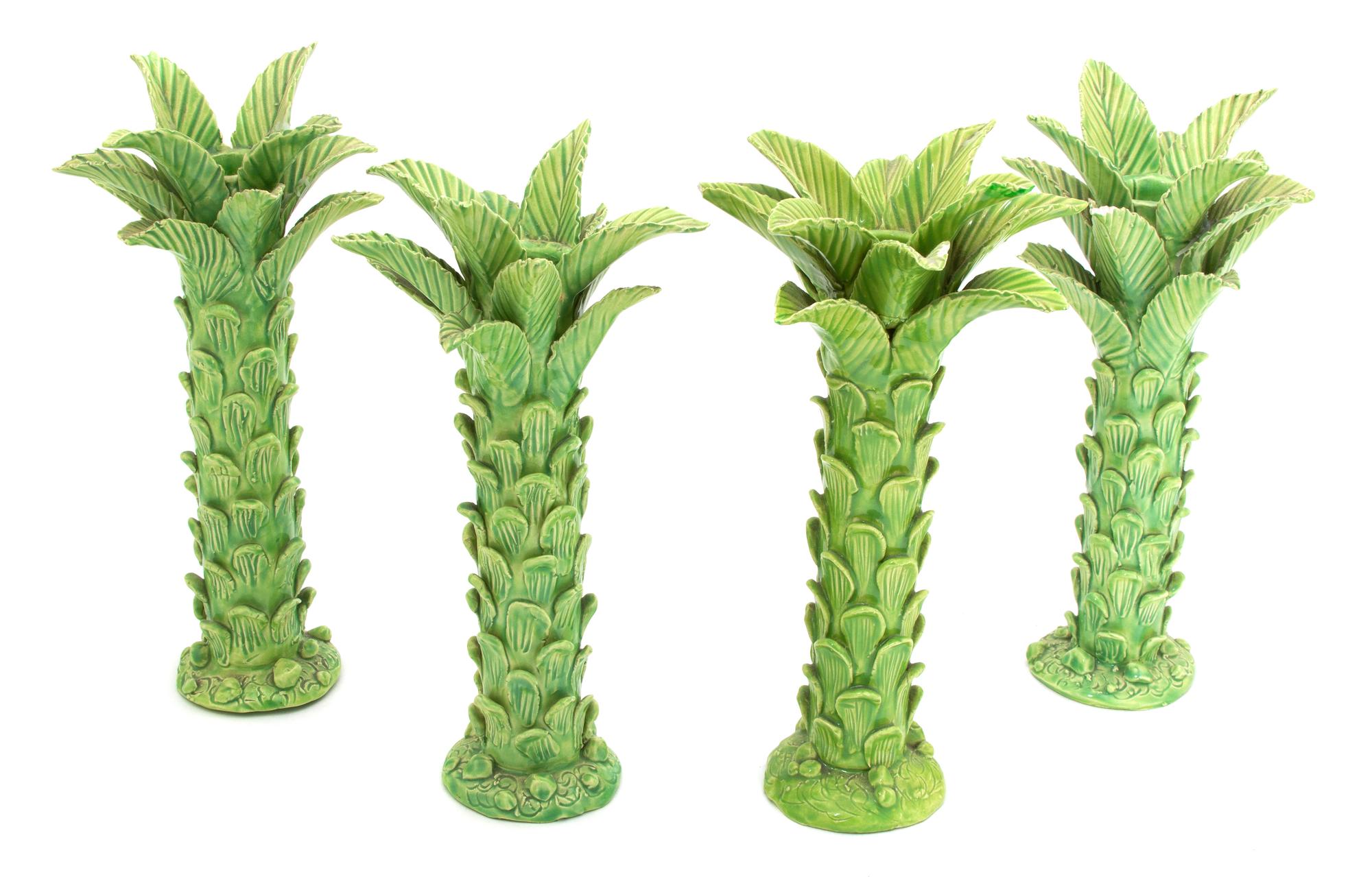 A Group of Four Madelaine Ryan Ceramic Palm Tree Candlesticks Height 12 inches. — 20TH CENTURY
