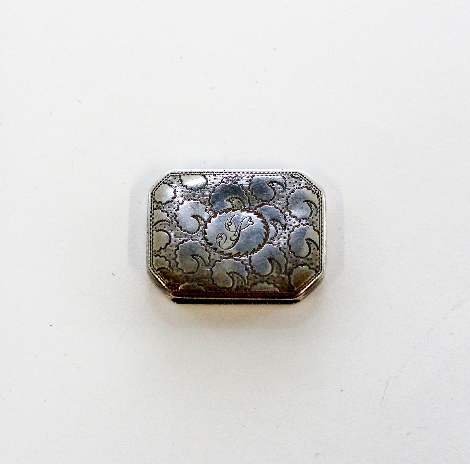 A George III Silver Vinaigrette, John Shaw, Birmingham, 1808, of rectangular form with canted corners, the lid and underside worked wit