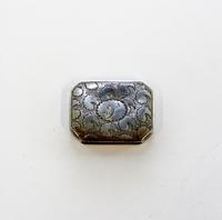 A George III Silver Vinaigrette, John Shaw, Birmingham, 1808, of rectangular form with canted corners, the lid and underside worked wit