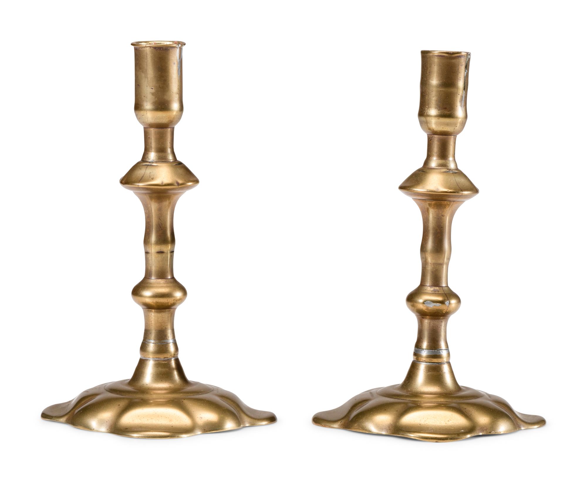A Pair of English Brass Scalloped-Foot Candlesticks