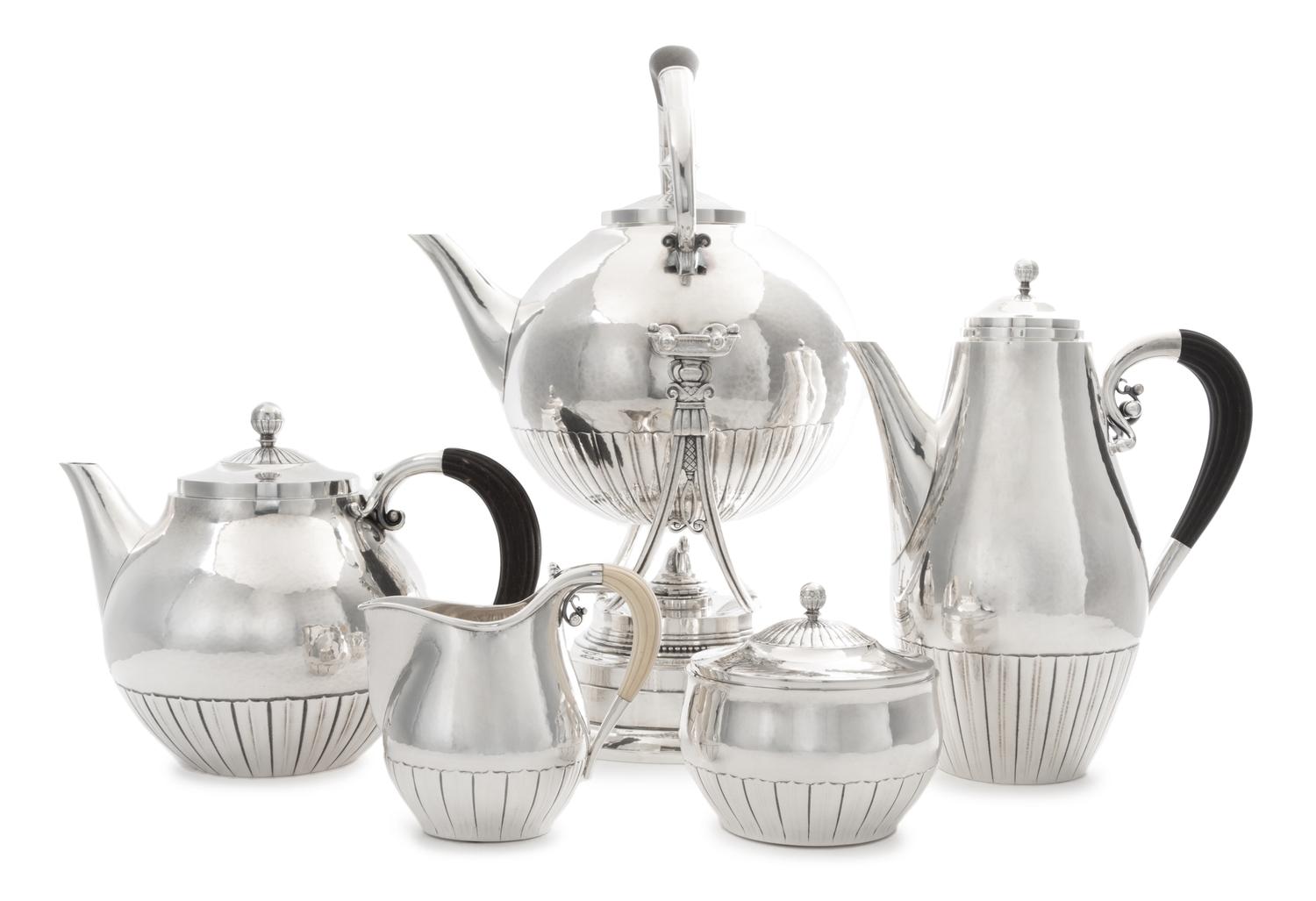 A Danish Silver Tea and Coffee Service, Georg Jensen Silversmithy, Copenhagen, Second Half 20th Century, Cosmos pattern, comprising a h