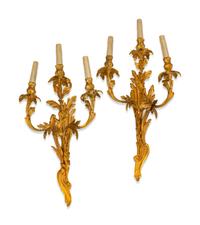 A Pair of Louis XV Style Gilt-Bronze Three-Light Sconces