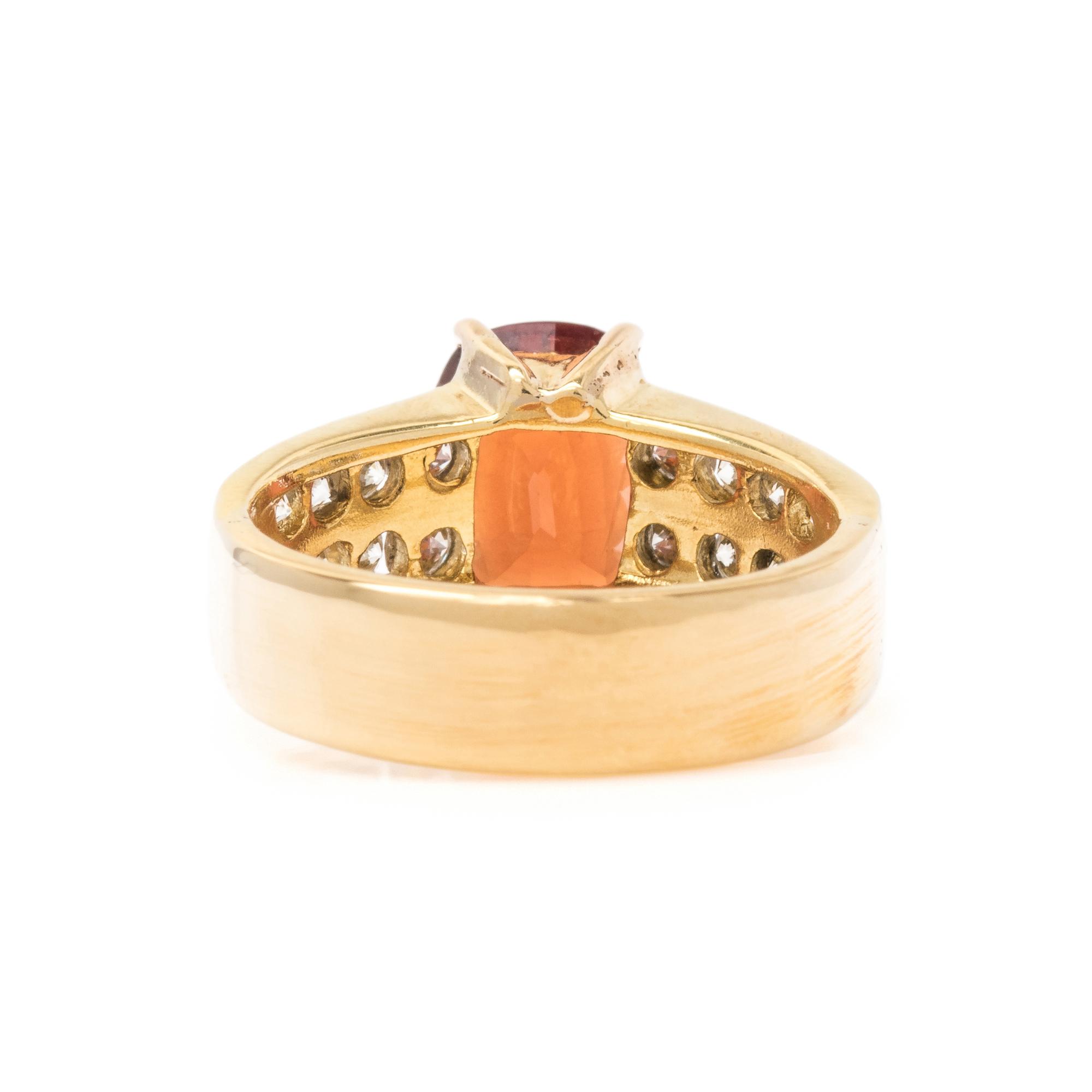 ORANGE GARNET AND DIAMOND RING