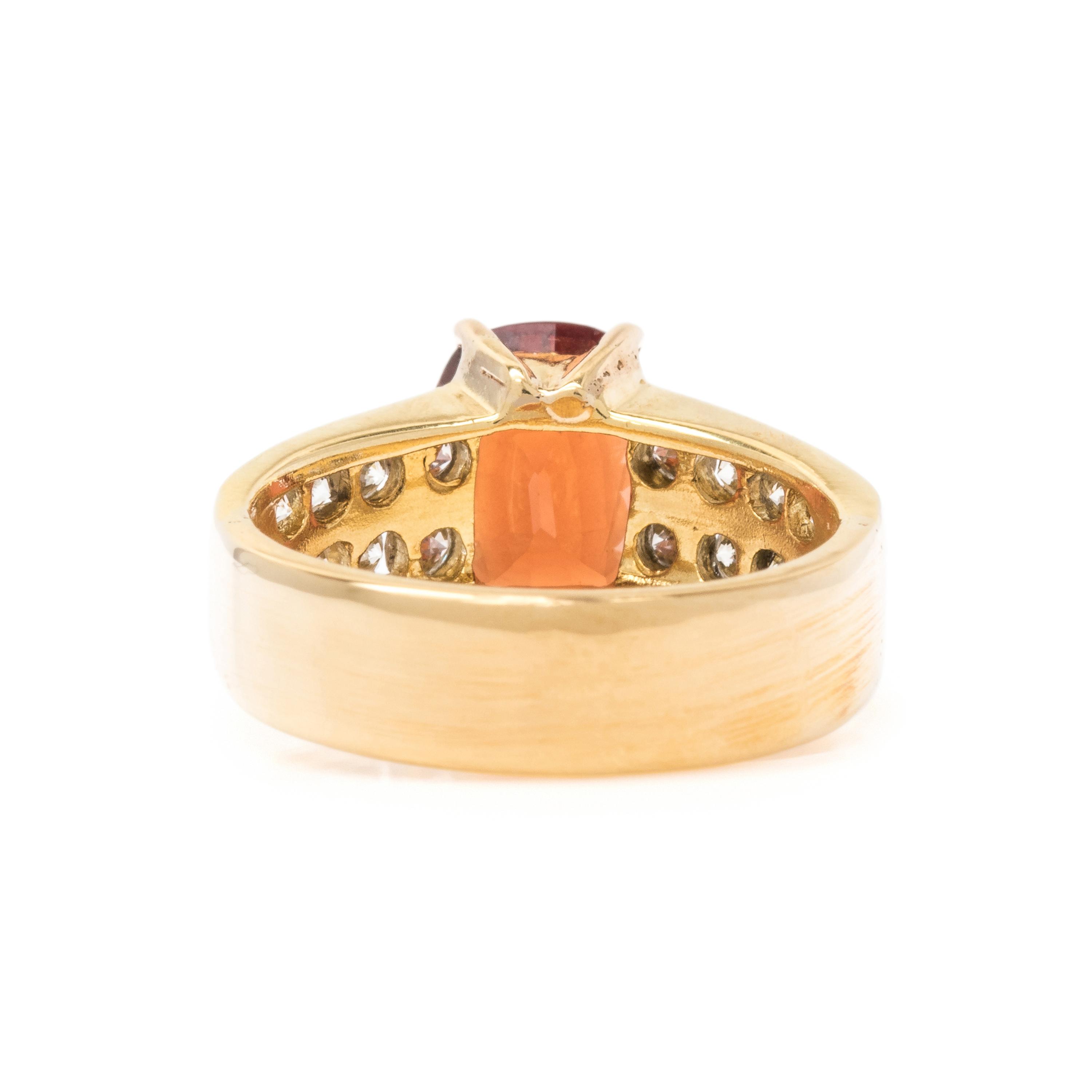 ORANGE GARNET AND DIAMOND RING