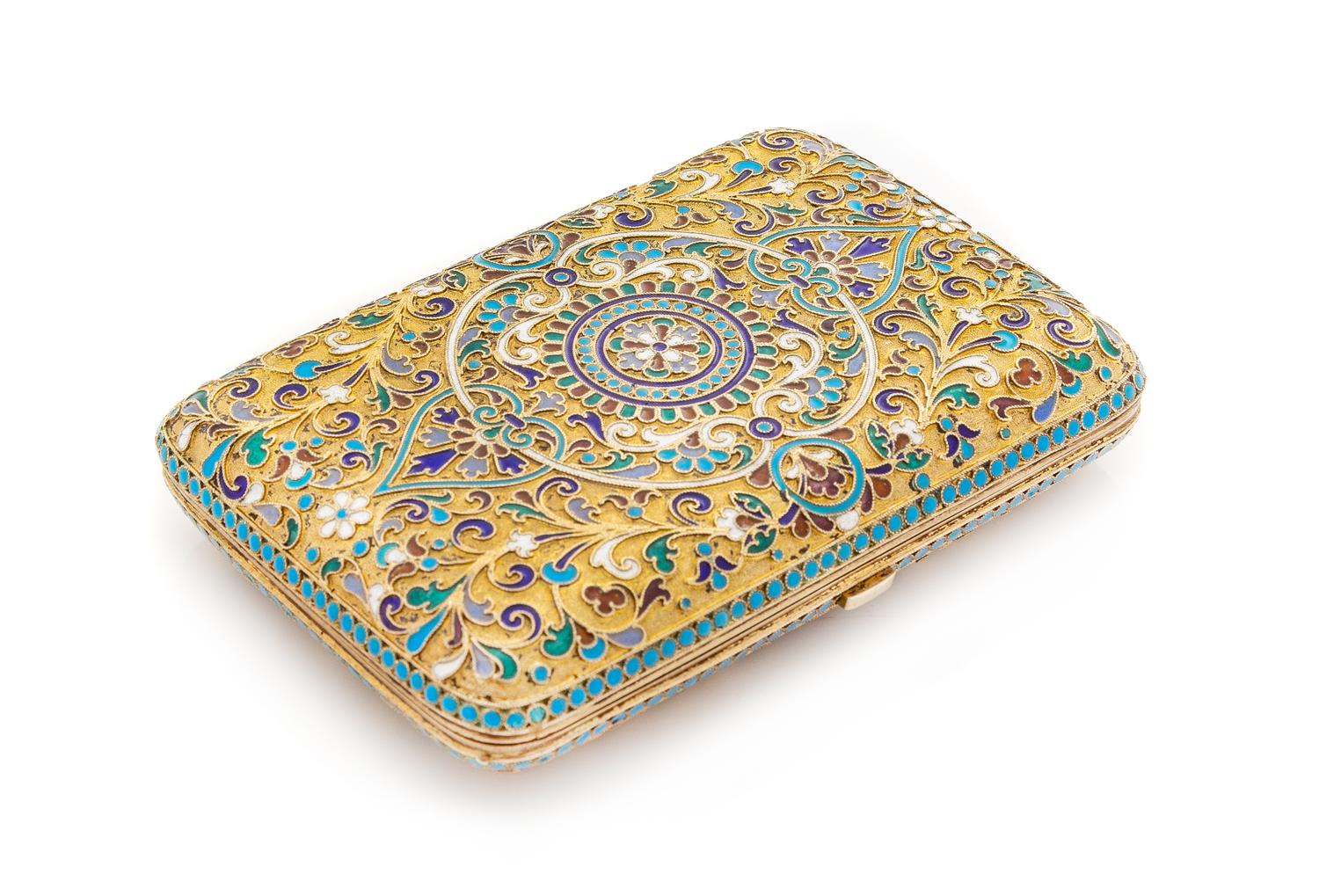A Russian Silver-Gilt and Enamel Cigarette Case, Likely Mark of V. Rassadin, Moscow, Late 19th Century, the lid with a central polychro