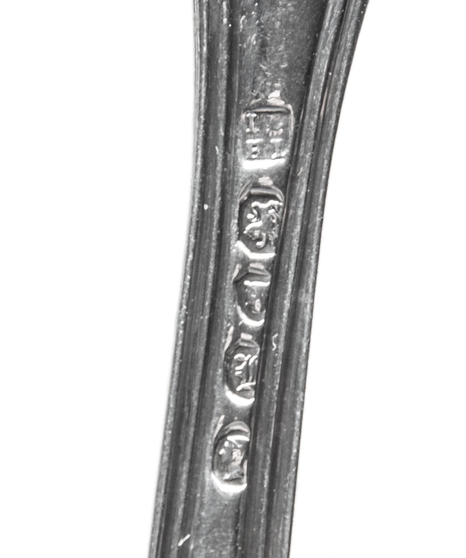 Two Victorian Silver Fish Slices, London, 1844 and 1846, comprising an example in the Victoria pattern with a star crest, William Eaton