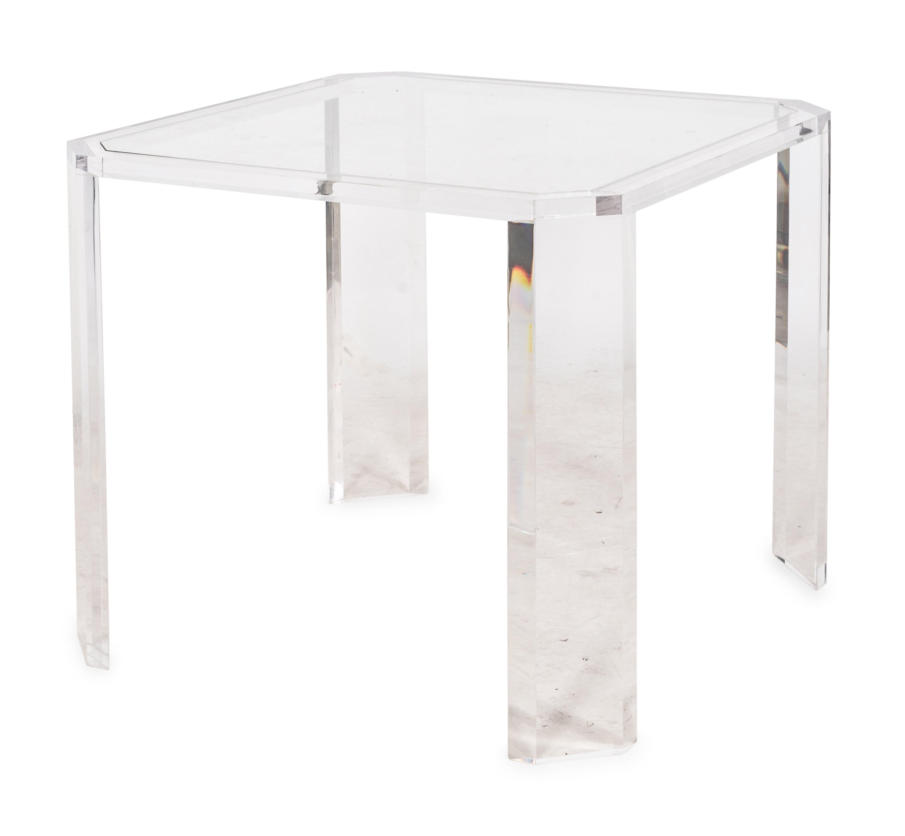An Acrylic and Glass Game Table