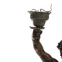 A Cast Metal Figural Newel Post Lamp