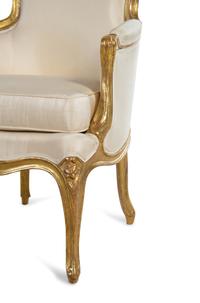 A Pair of Louis XV Carved Giltwood Bergères