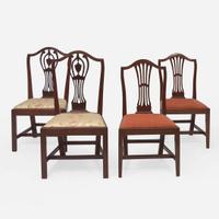 An assembled group of four Federal carved mahogany side chairs New England and other, circa 1795