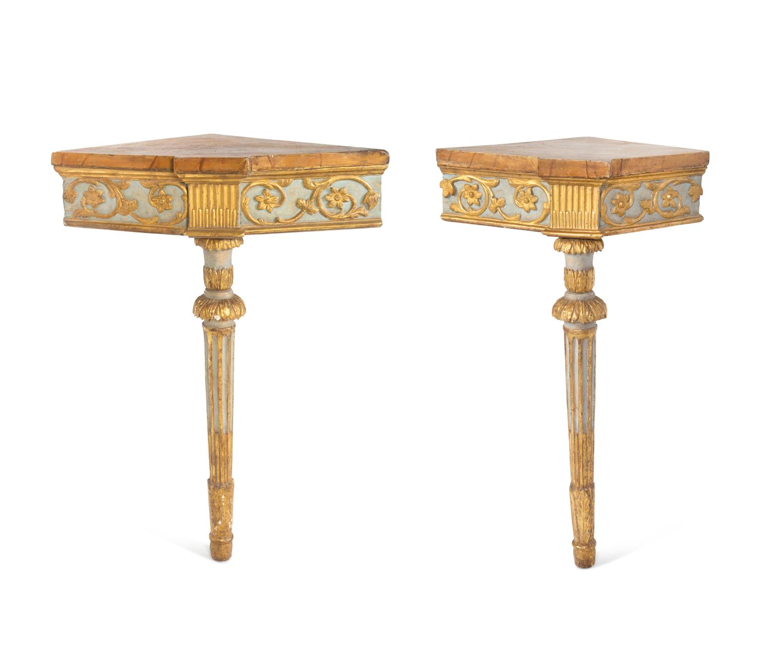 A Pair of Italian Carved, Painted and Giltwood Corner Console Tables