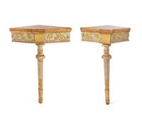 A Pair of Italian Carved, Painted and Giltwood Corner Console Tables