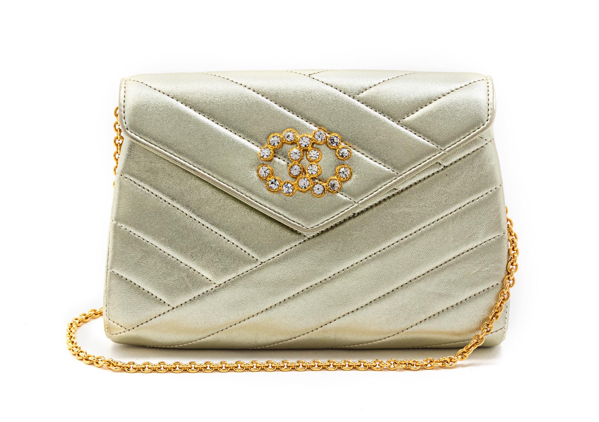 A Chanel Gold Metallic Chevron Quilted Leather Flap Bag, 7 1/2 x 5 x 1 1/2 inches.