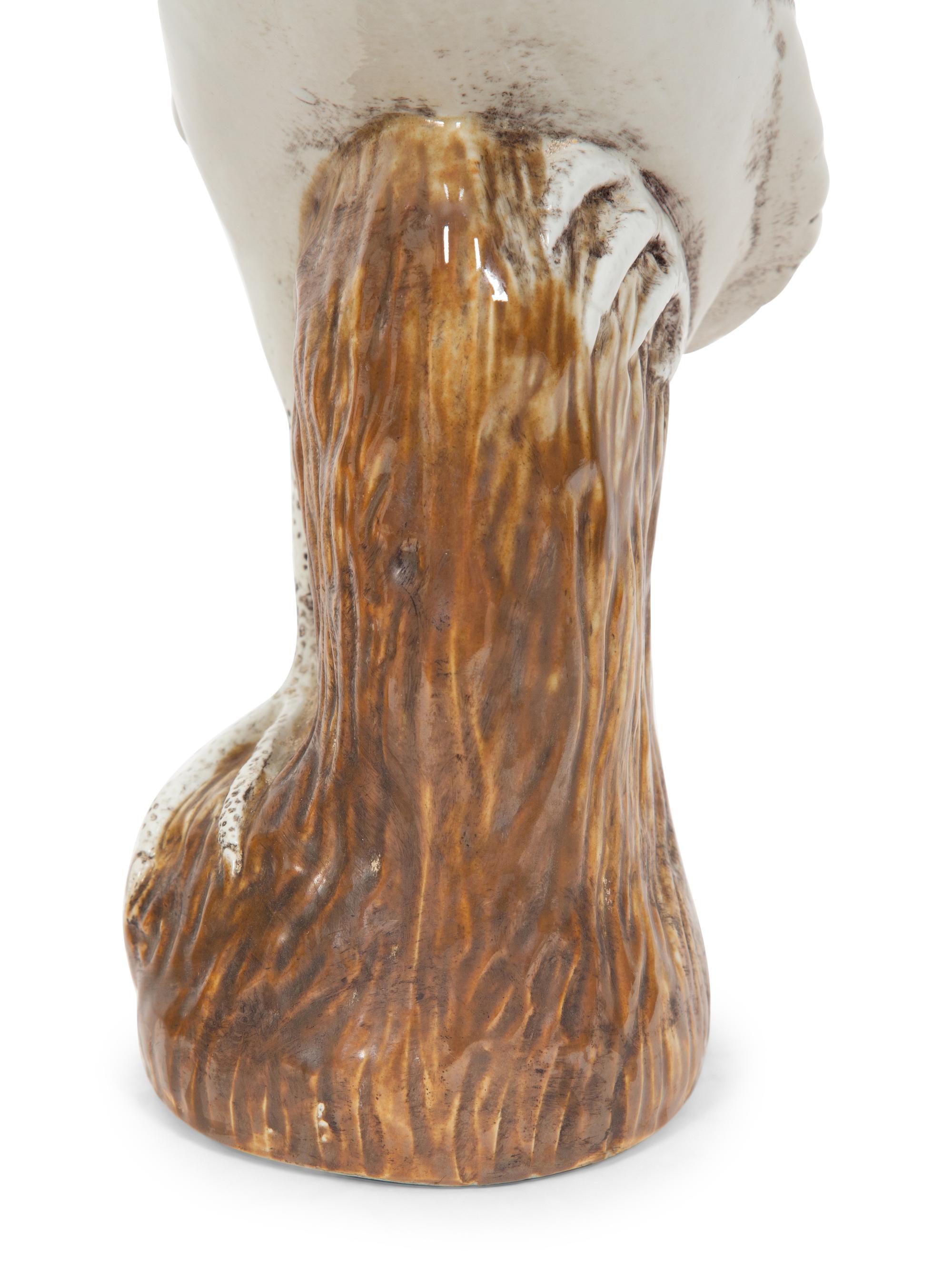 A Pair of Chinese Glazed Ceramic Cranes