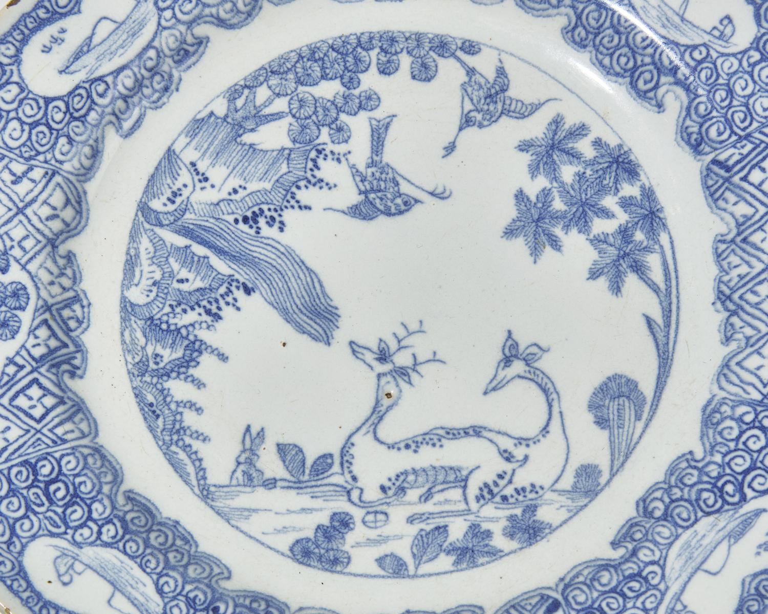 An English Delft octagonal blue and white "Chinoiserie" plate, circa 1750
