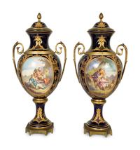 A Pair of Sèvres Style Porcelain Urns