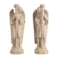 A Pair of Composition Figural Prickets