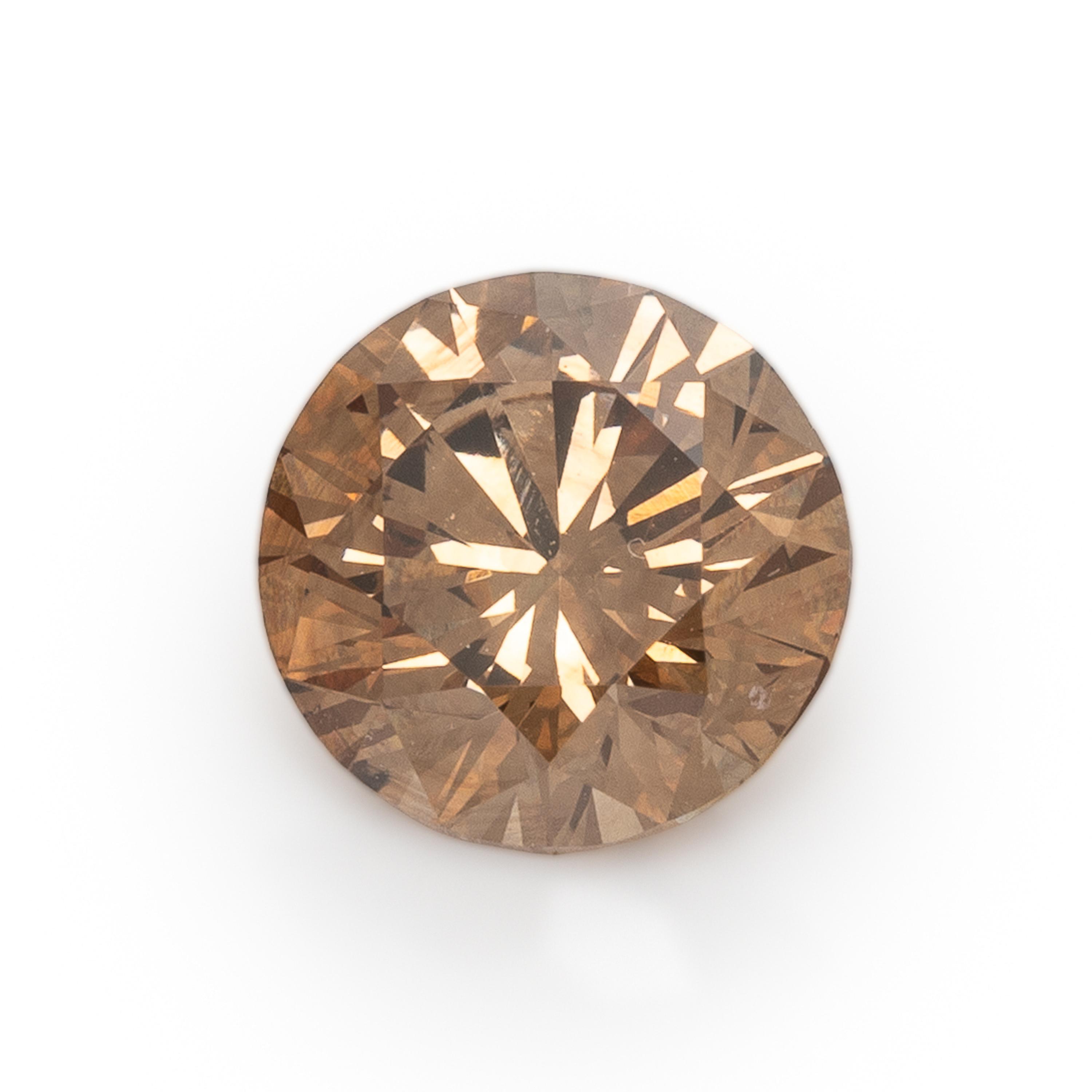 Pair of Fancy Dark Orange-Brown Diamonds