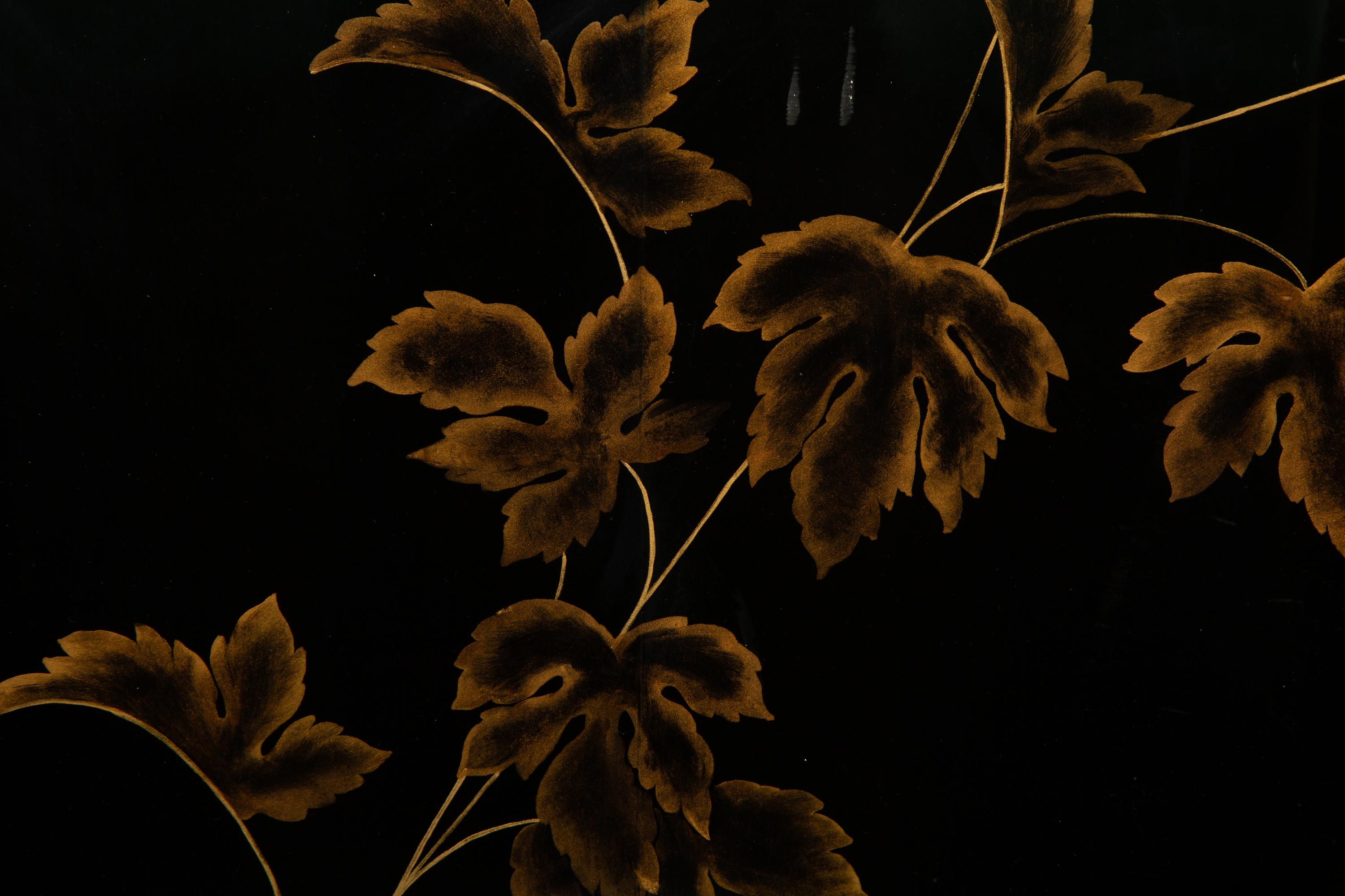 A Pair of Modernist Chinese Black and Gilt Decorated Lacquered Side Tables