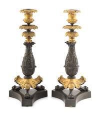 A Pair of Louis Philippe Gilt and Patinated Bronze Candlesticks