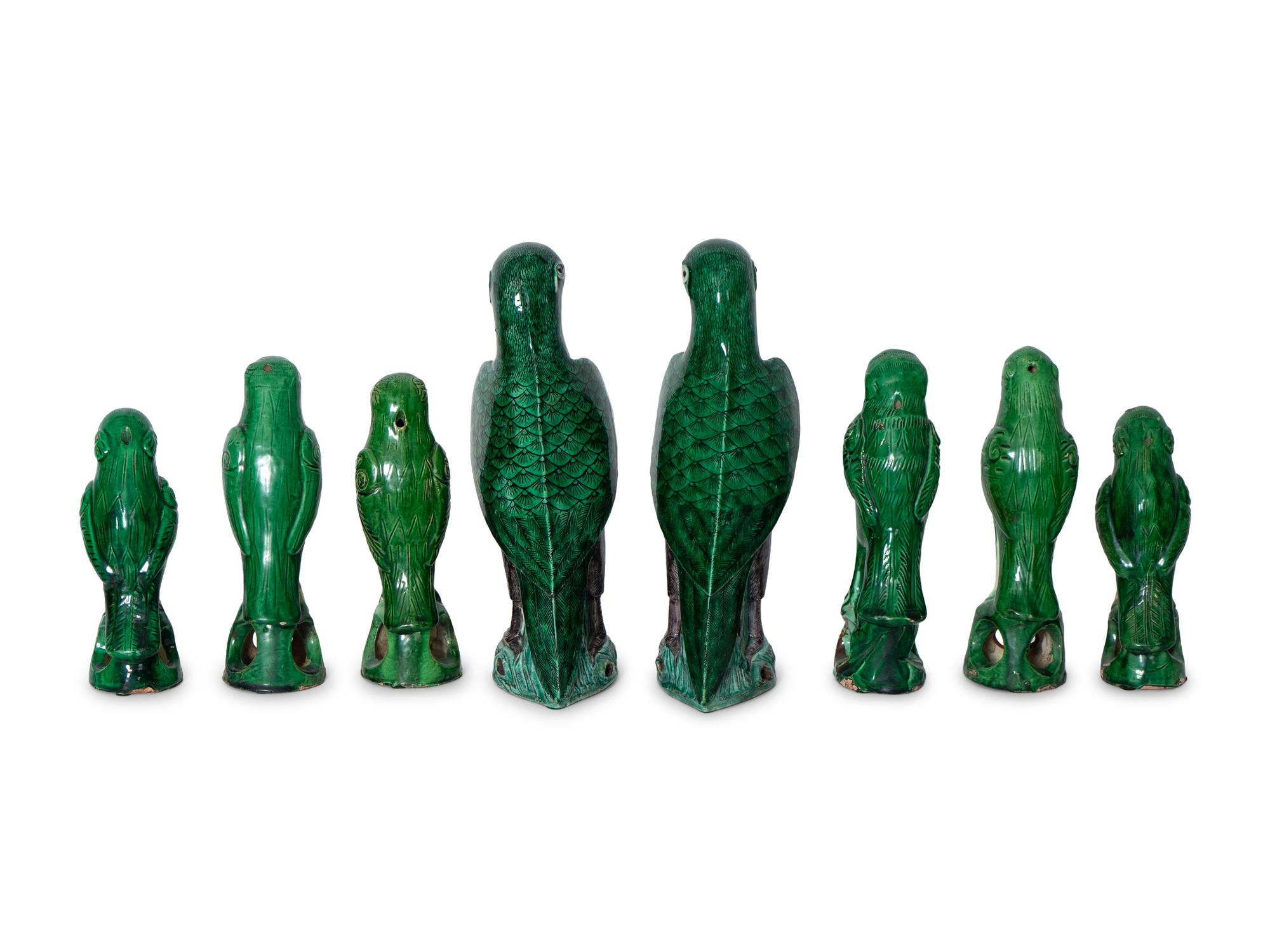 A Group of Eight Chinese Export Ceramic Parrots