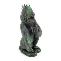 A Carved Ruby Zoisite Figure of a Seated Monkey