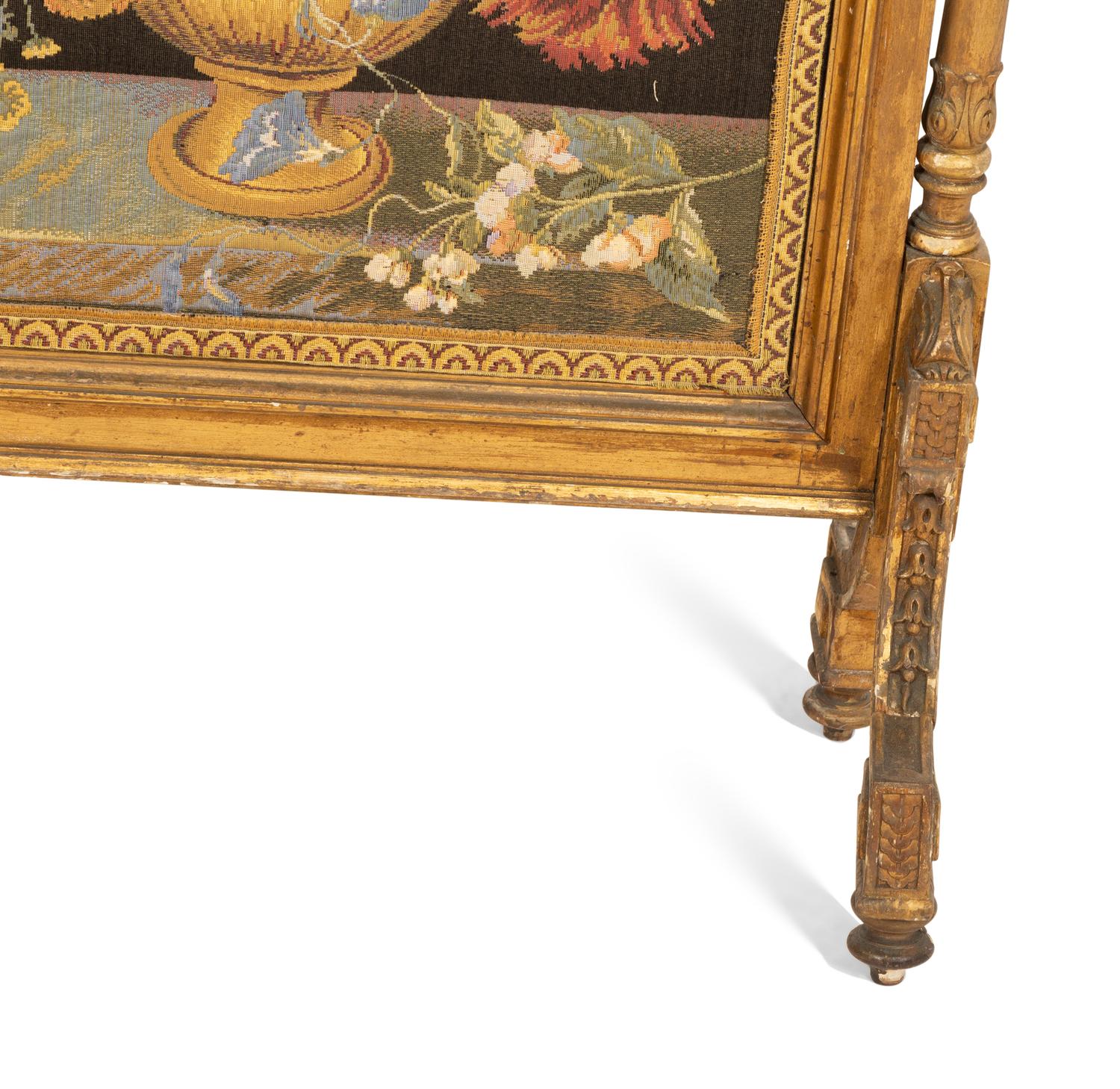A Louis XVI Style Giltwood Fire Screen with Needlework Panel