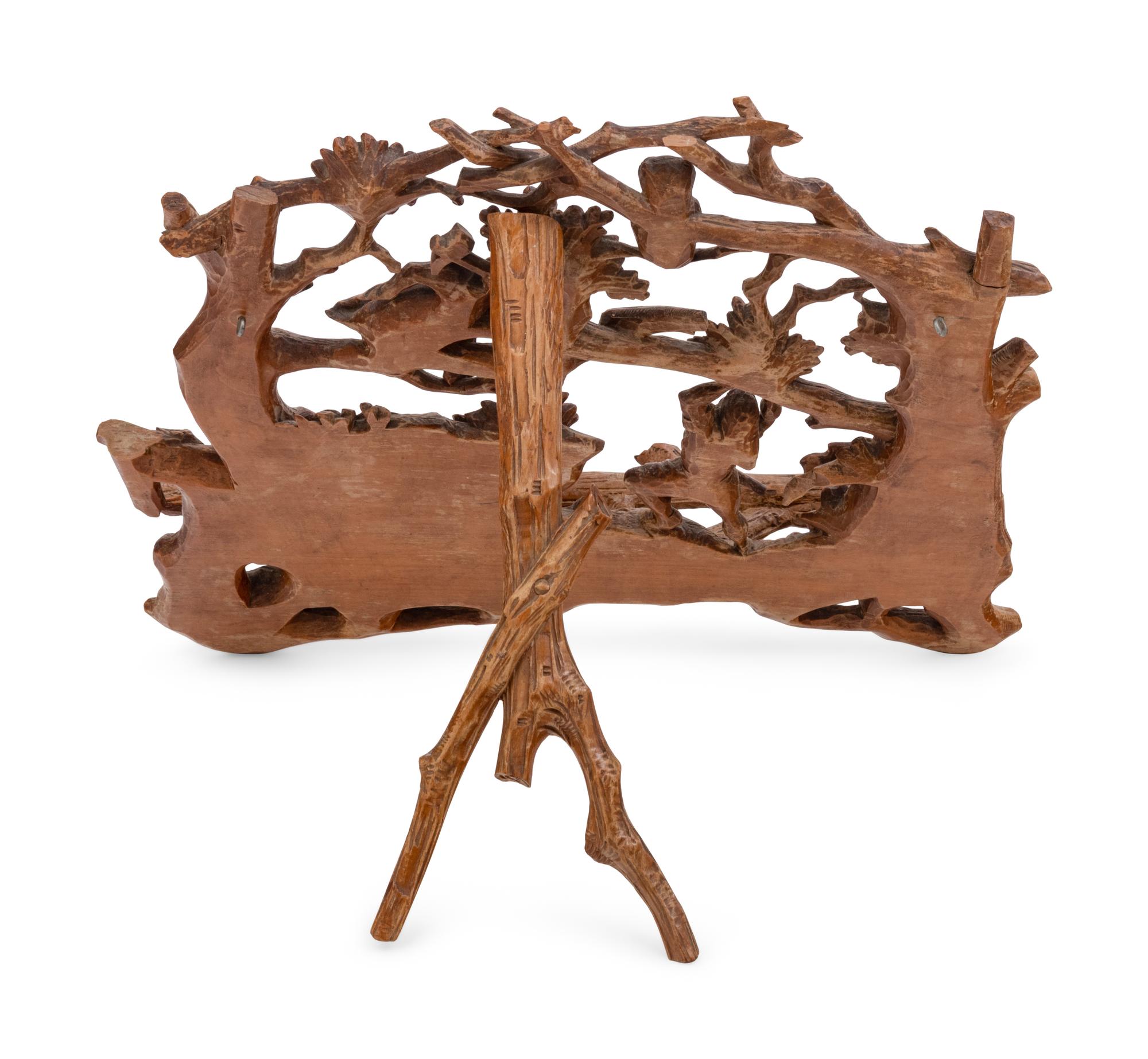 A Black Forest Carved Music Stand