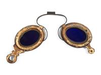 A Gilt Metal and Glass Optician's Trade Sign