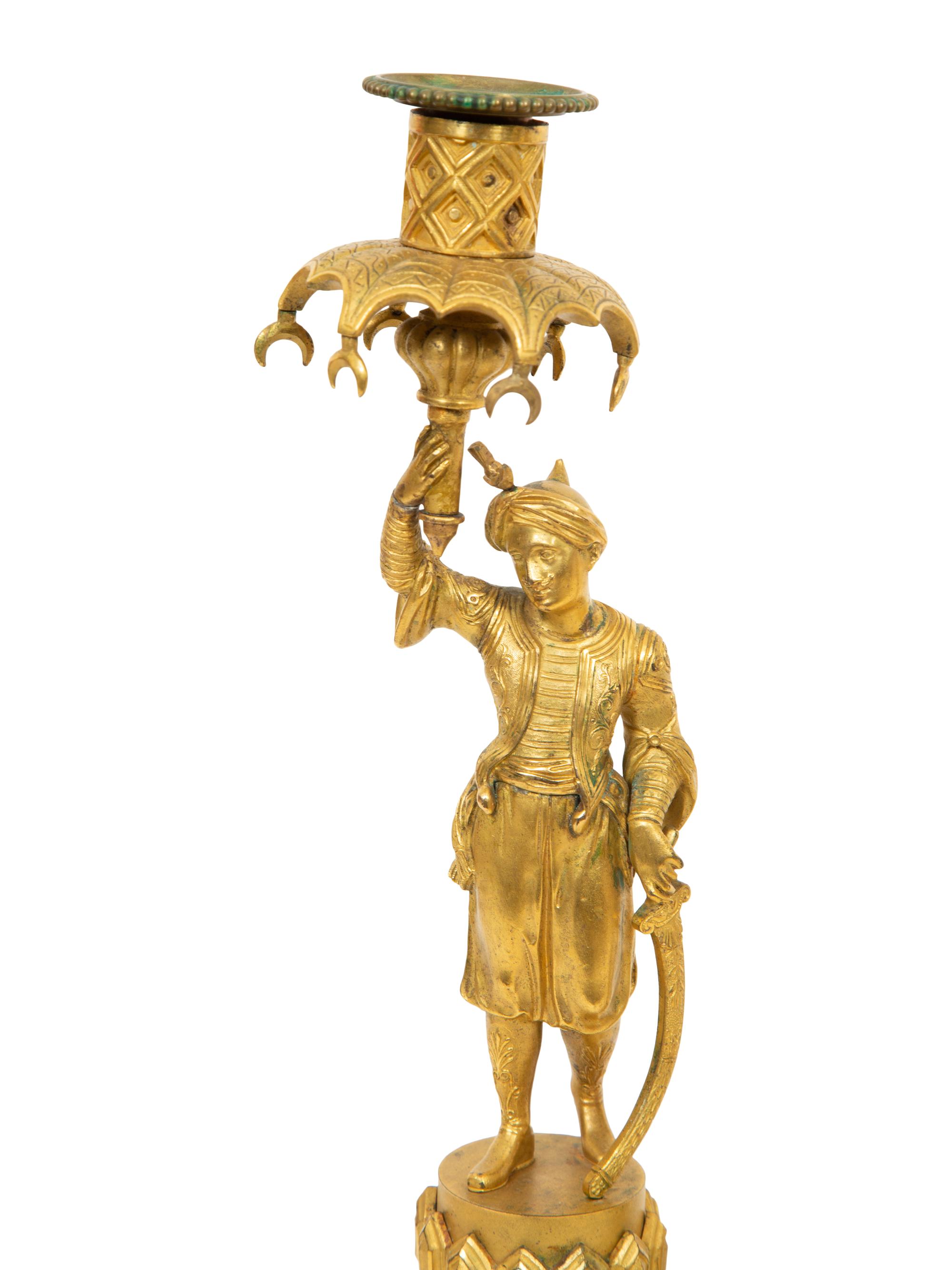 A Pair of Continental Gilt Bronze Candlesticks